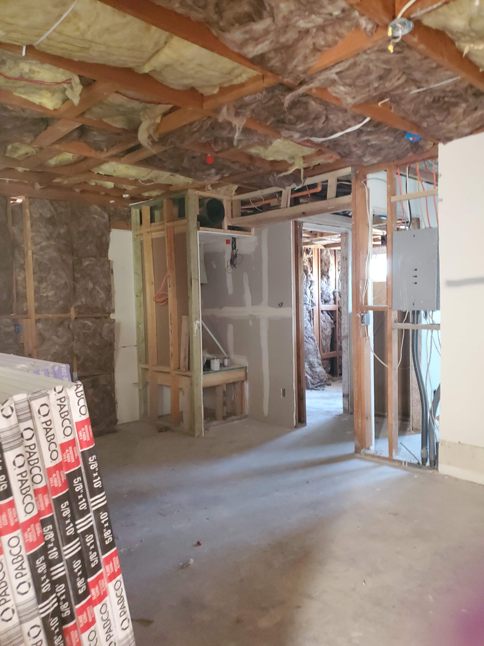 Framing stage interior with duct work and insulation in place